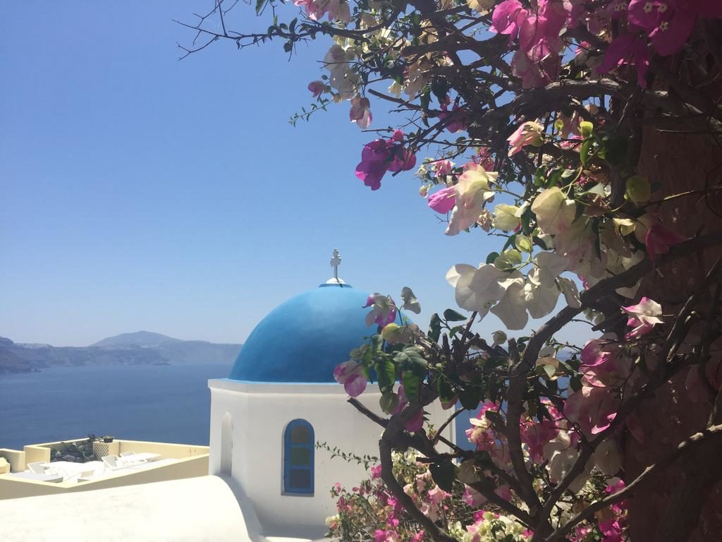 Oia's iconic blue domed church